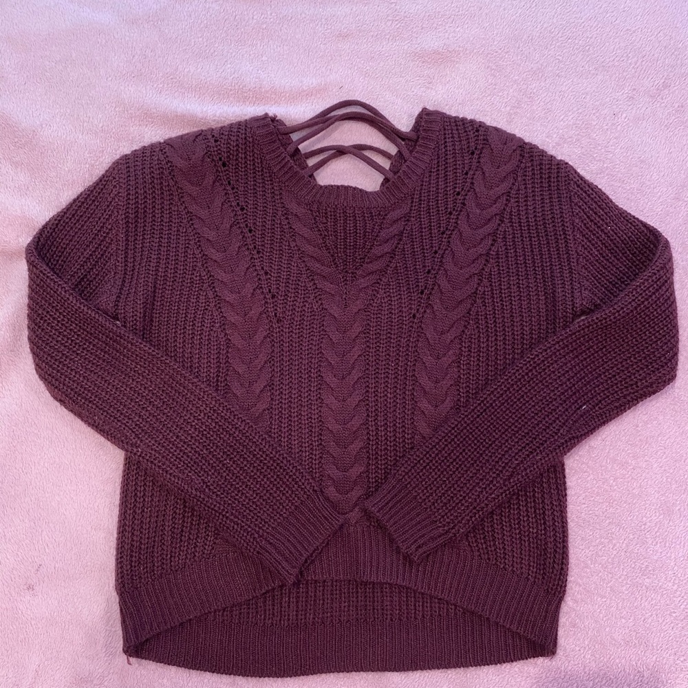 Burgundy sweater. Size small, not itchy.